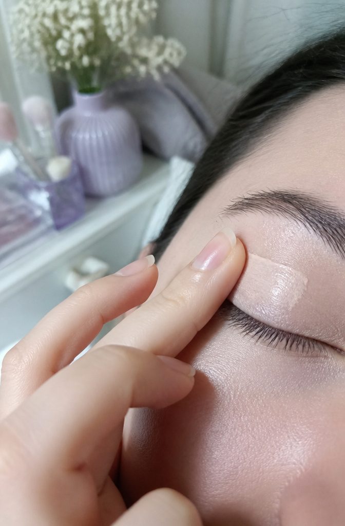 Icy Pastel Makeup: How to Create a Frosty Eye Look in 6 Steps 2 Close-up of model's primed eyelids with a dewy finish.
